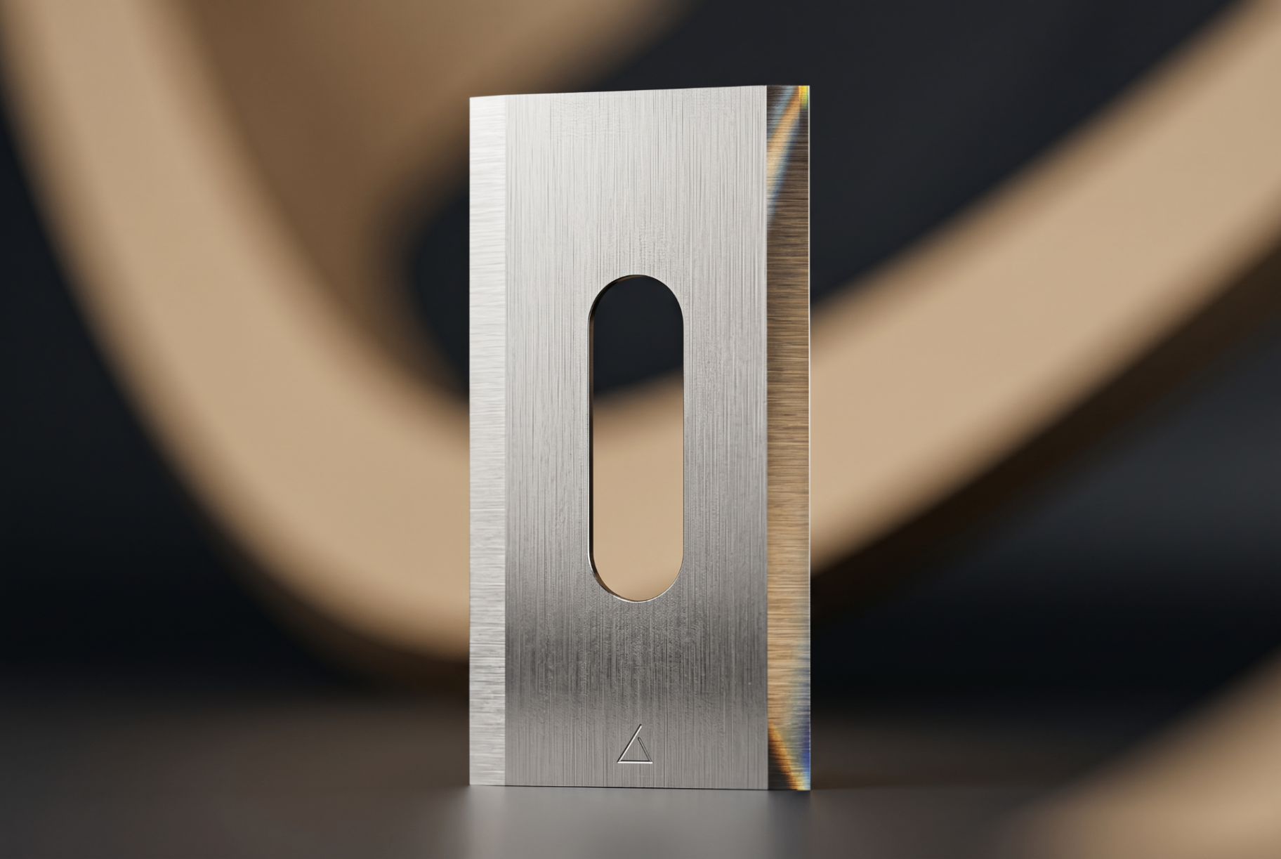 Close-up of a titanium-coated robotic mower blade